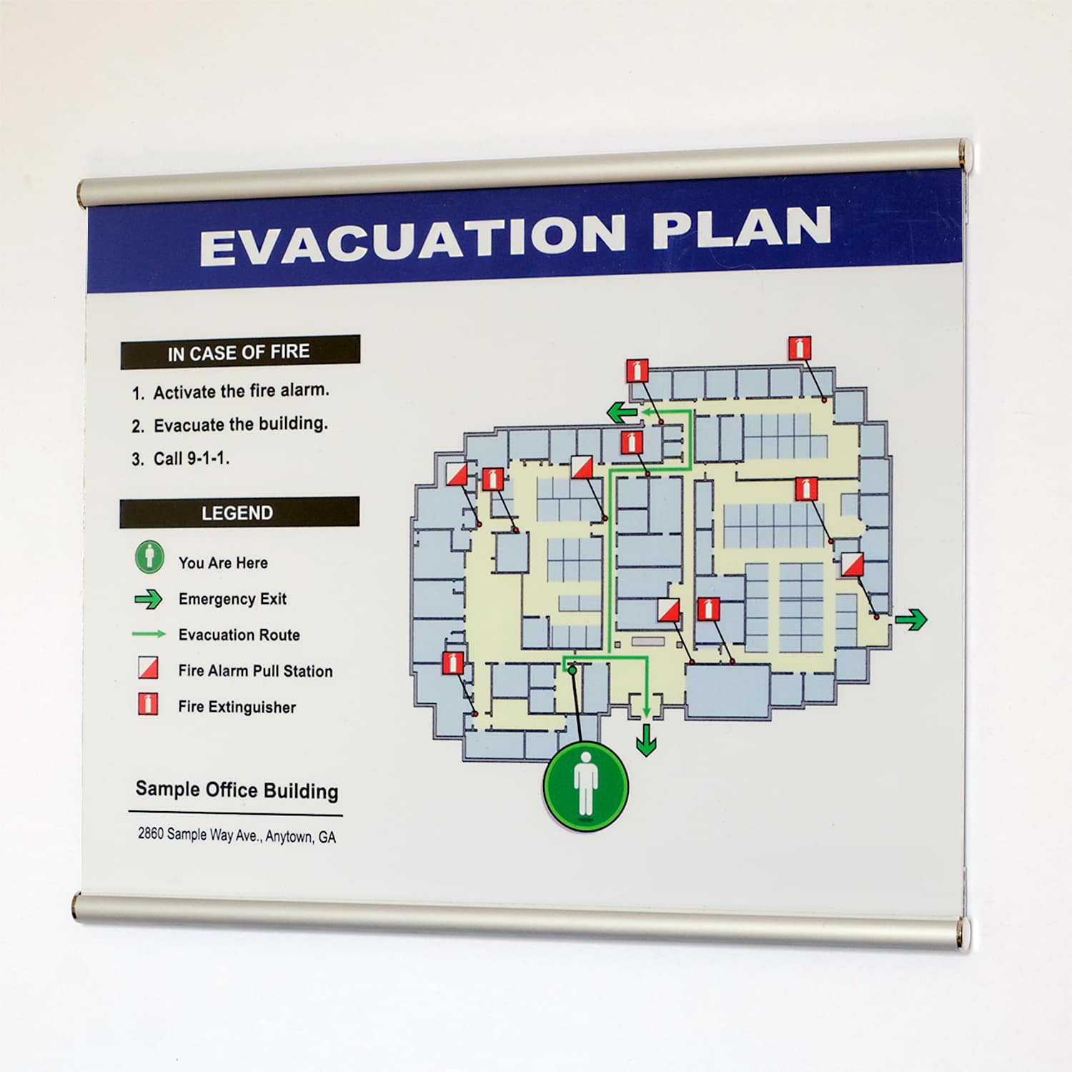Silver aluminum rail system holder with evacuation plan showing office building layout, fire extinguisher locations, and exit routes