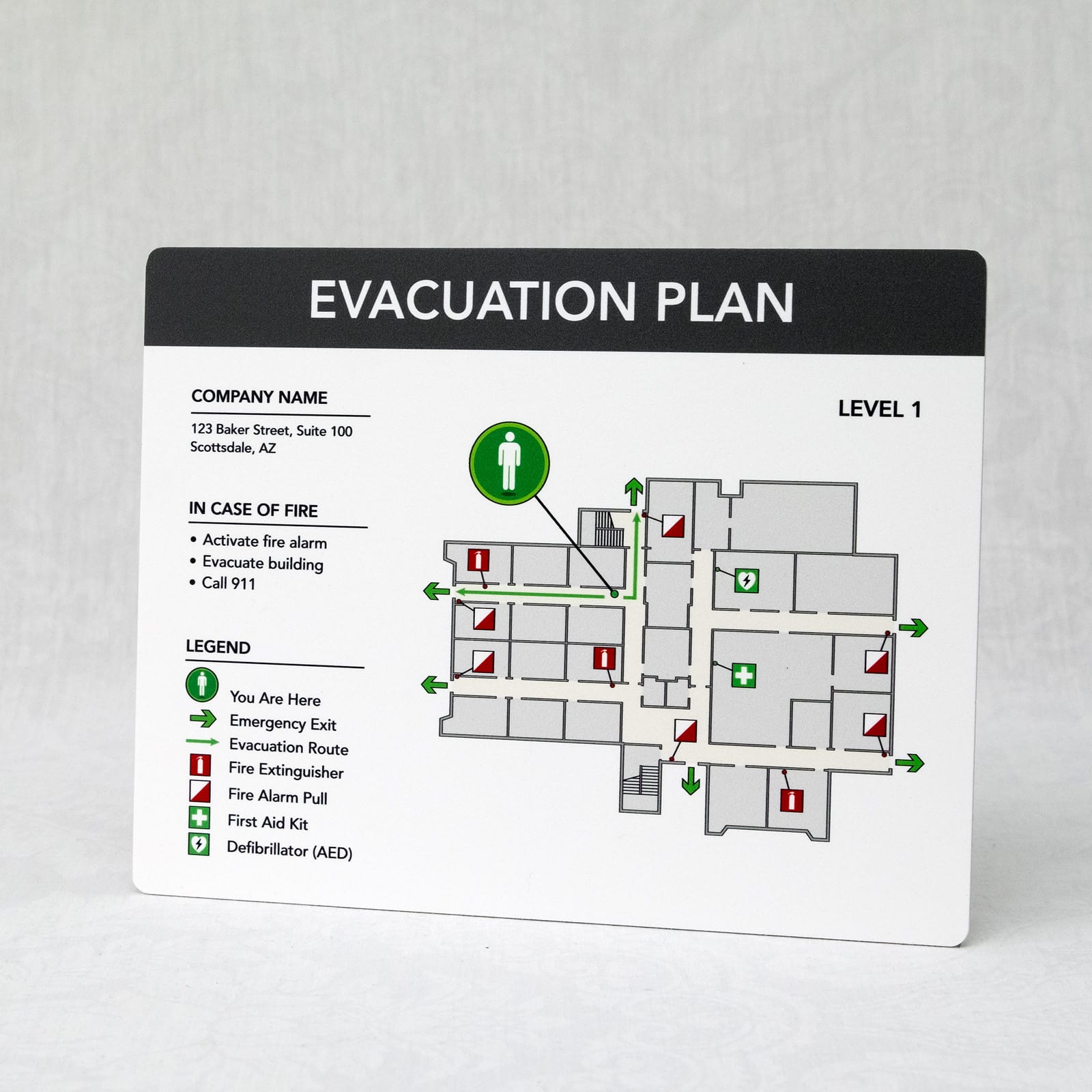 Sintra PVC evacuation plan full view showing level 1 floor layout with fire safety icons, AED locations, and emergency procedures